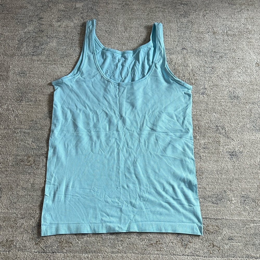 Lululemon women’s tank top
Size see measurements
Color baby blue